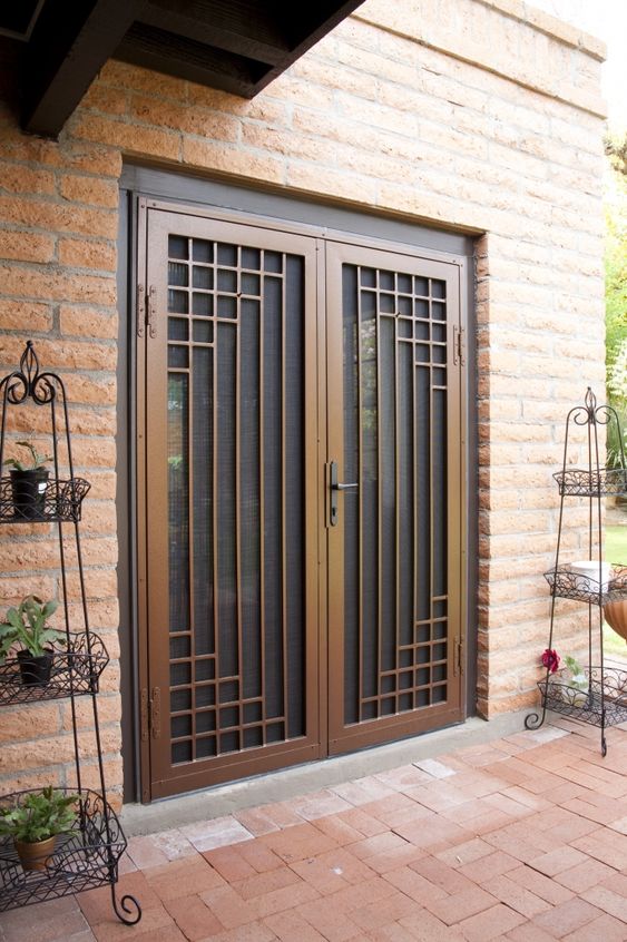 Door Grill Design: 50+ Ideas to Safeguard your Doors elegantly in 2024, image size:563x846