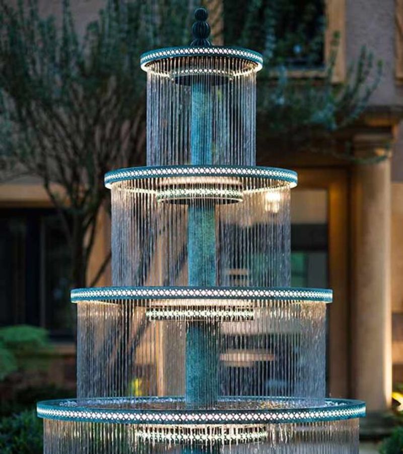 Decorative lighted fountains in garden