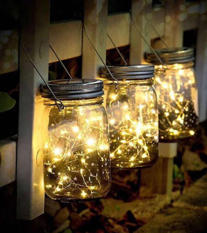 Mason jar lanterns for ambient lighting in balcony