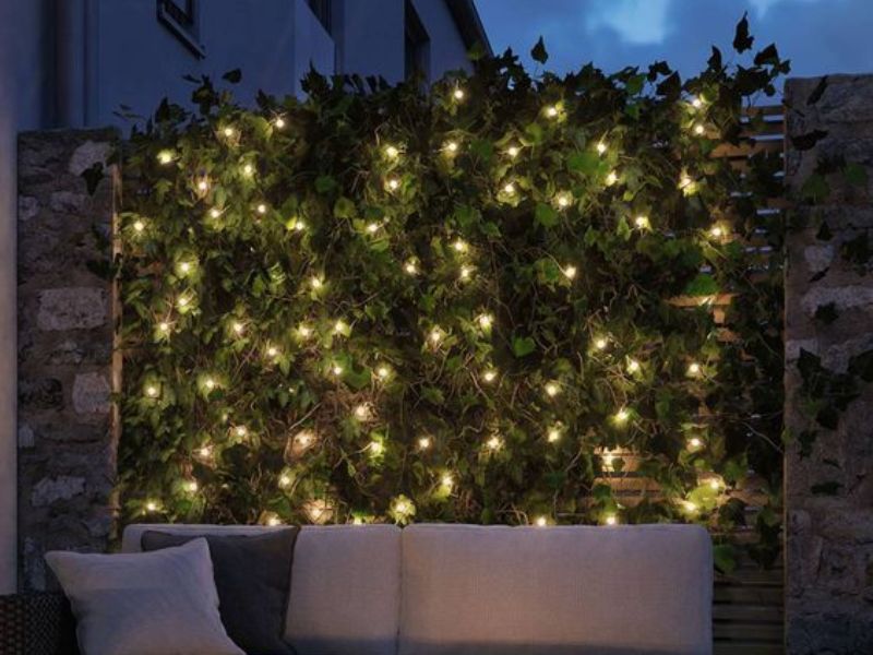 Rice lights in planters for a dreamy outdoor decor